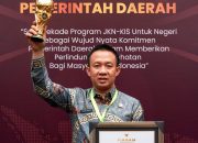 Pj.Bupati Pringsewu Terima Penghargaan Universal Health Coverage